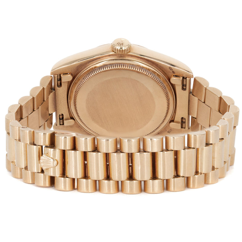 Rolex Day-Date 40 Presidential | 18k Rose Gold 228235 | Chocolate Baguette Diamond Dial | Fluted Bezel