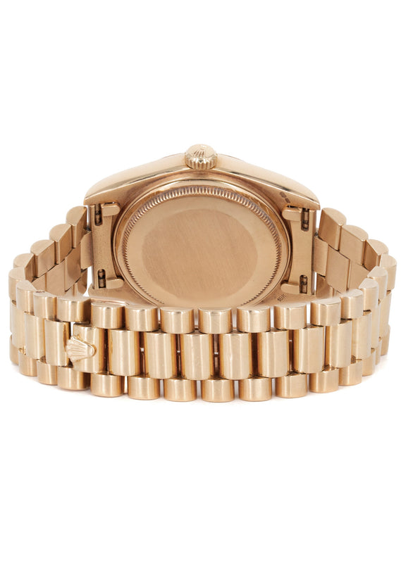 Rolex Day-Date 40 Presidential | 18k Rose Gold 228235 | Chocolate Baguette Diamond Dial | Fluted Bezel